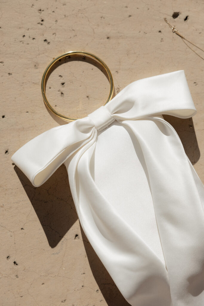 Sophisticated wedding detail flatlays, shot by a luxury Phoenix wedding photographer specializing in Catholic weddings